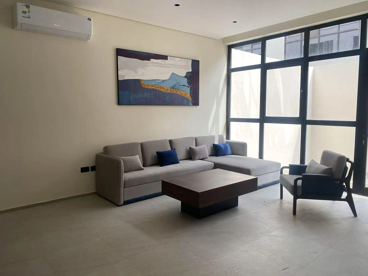 Furnished living and reception area inside a suite at Snood Al Narjis Hotel