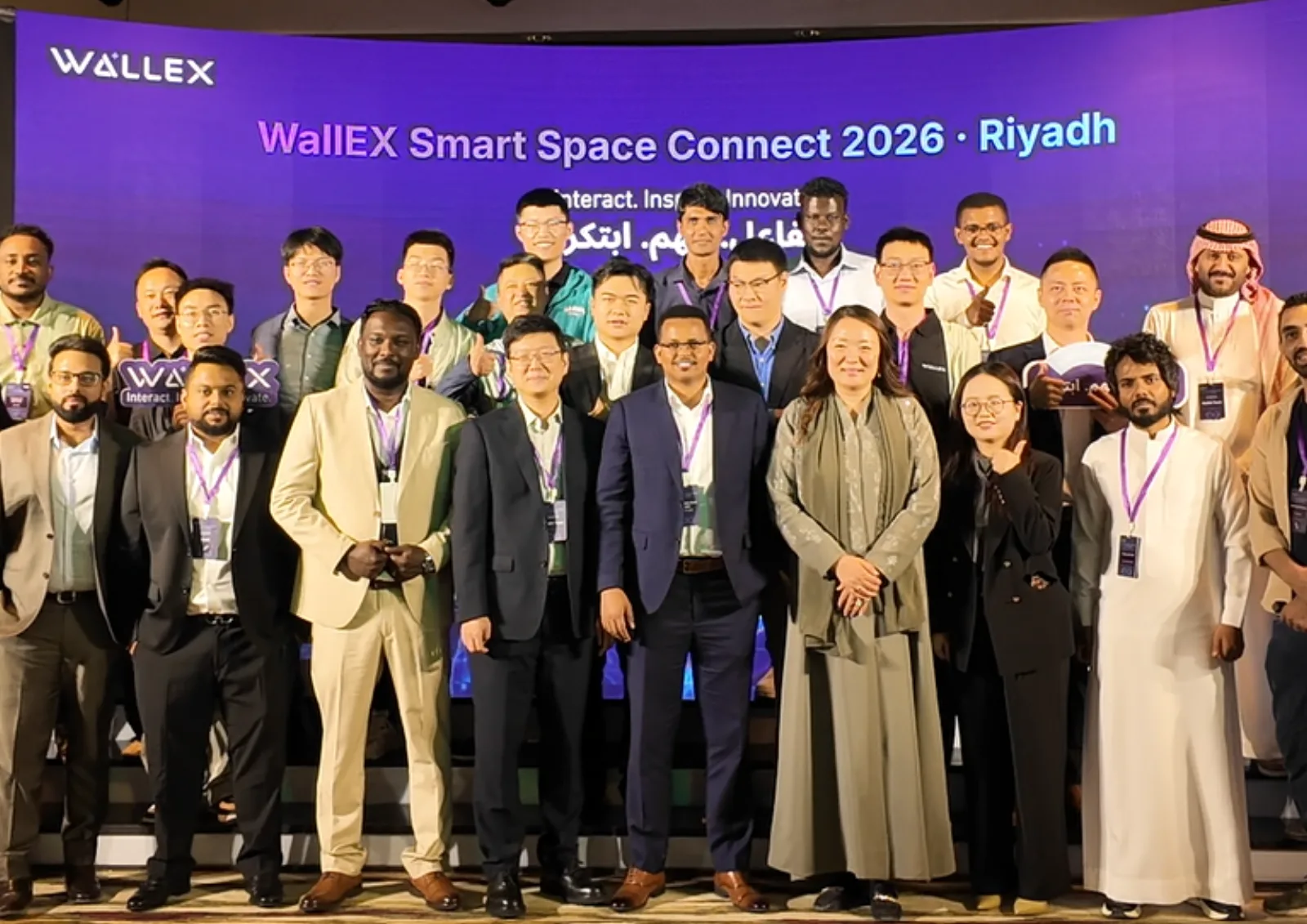 The DSCC and iFLYTEK teams at WallEX Smart Space Connect 2026 in Riyadh